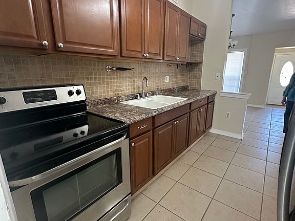 Kitchen (view from 3rd bedroom/bonus room)