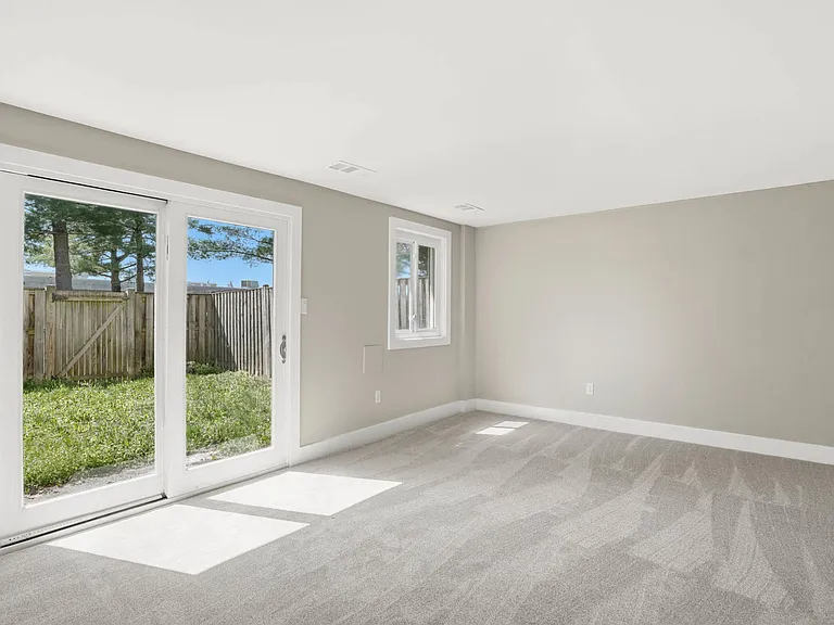 Finished lower level family room w/ walk out