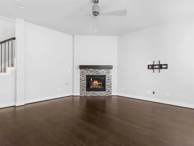 Gas Fireplace and TV Mount on Wall in Den