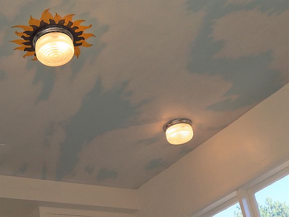 Sunny day mural on kitchen ceiling