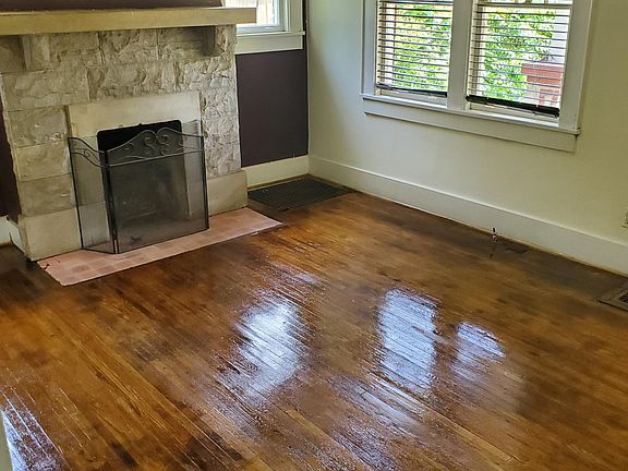 Original floors, fireplace windows and molding.