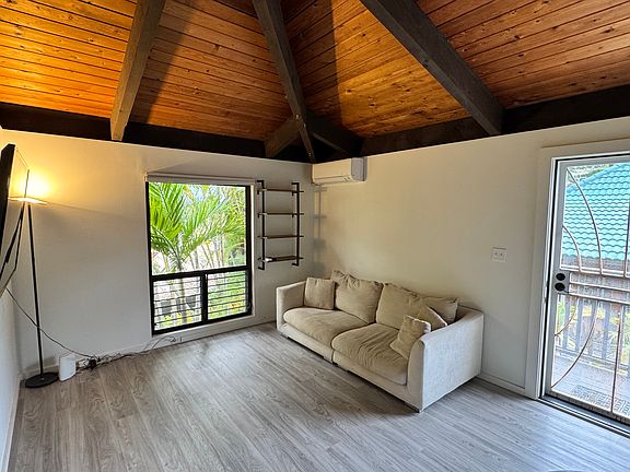 living room with AC. comes with big screen tv, sofa (furniture optional).