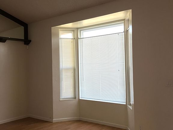 Living room view with bay windows