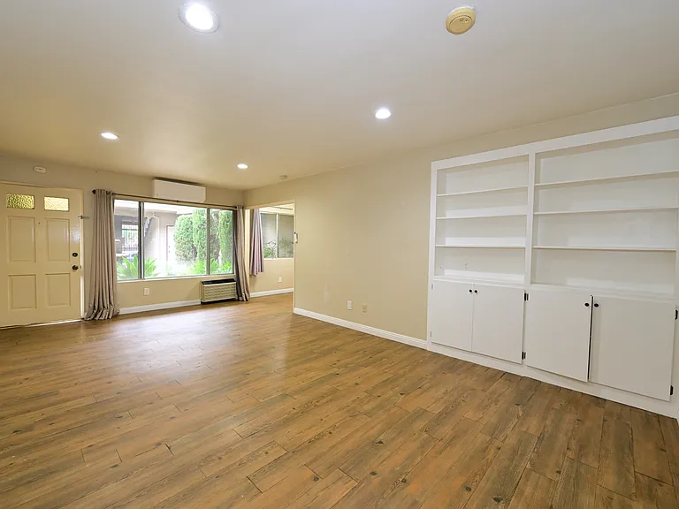 Fully Updated unit with In-unit Laundry, built-in cabinet, SS kitchen appliance + quartz countertop