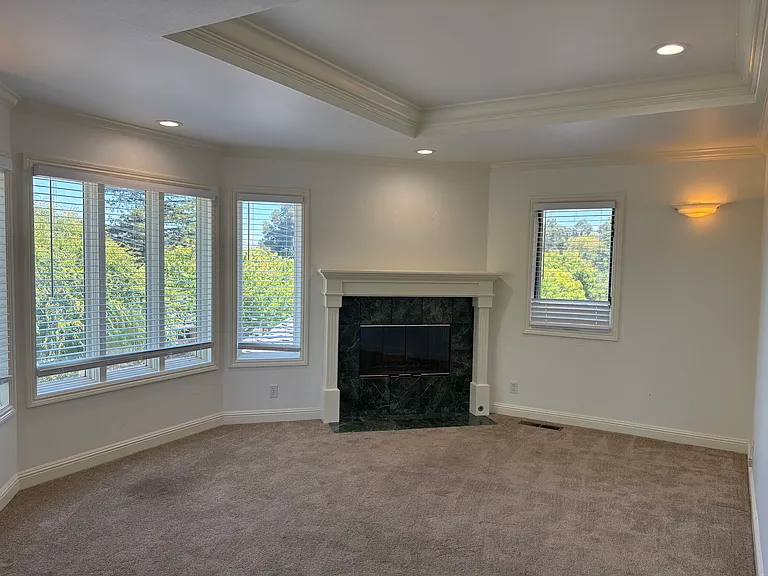 Primary bedroom with fireplace