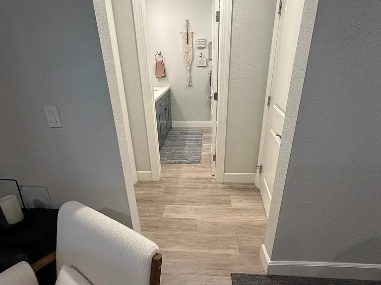 hallway to bathroom form living area