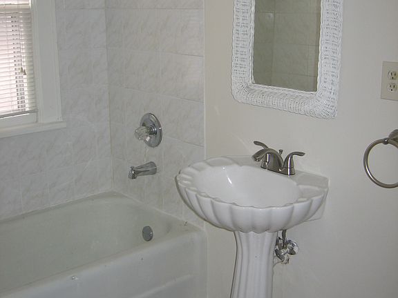 Bath with utility closet