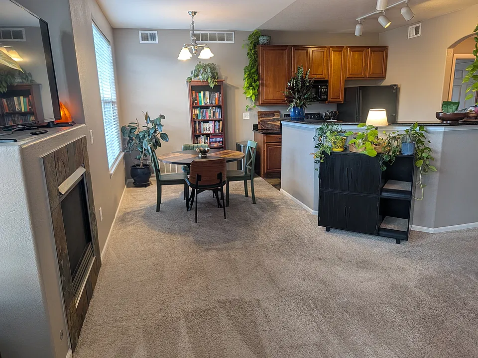 Open concept layout has direct views of kitchen allowing for easy communication and connection throughout the main area