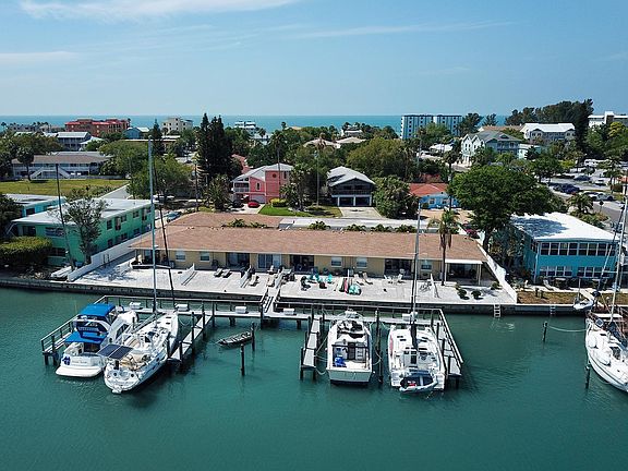 Aerial view of the waterside of Bougainvillas On The Bay II