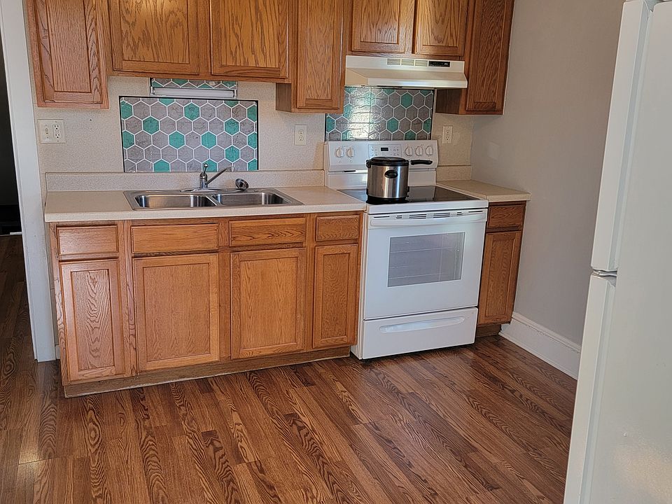 Kitchen with brand new flooring, painting and plenty of cabinet storage space!