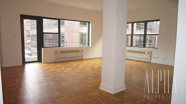 Living room w/ balcony