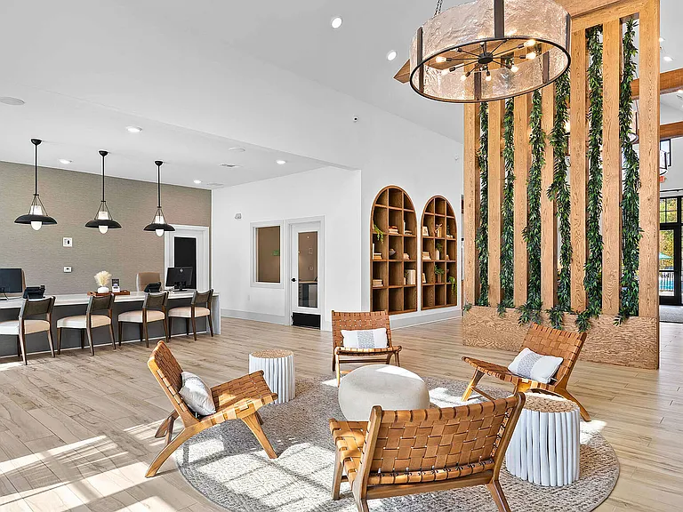 Experience the elegance of this modern community lounge, perfect for relaxation and social gatherings.