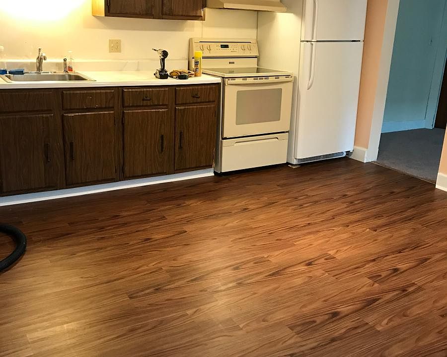 Kitchen with stove and refrigerator