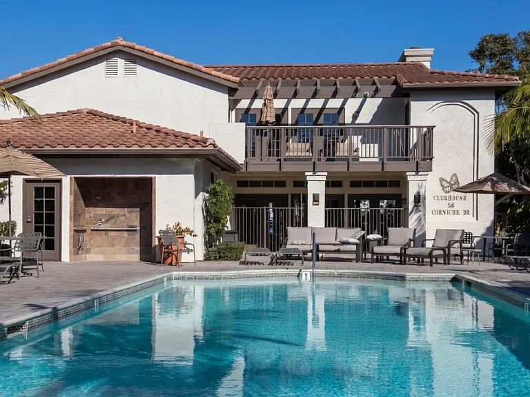 Relax and recharge at stunning clubhouse pool with spacious lounging area.