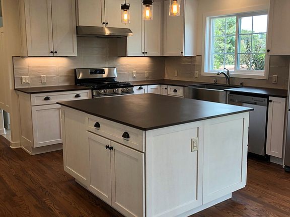 Beautiful custom kitchen with open dining-living concept!