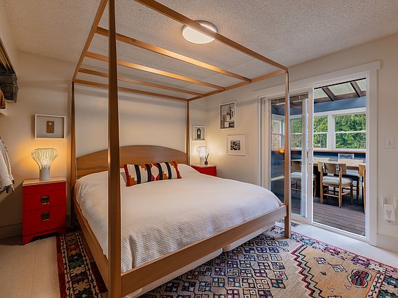 Primary bedroom with outdoor patio access