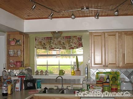Kitchen Window & Old Oak Canopy outside
						:
						Kitchen sink, with view of tray ceiling etc.