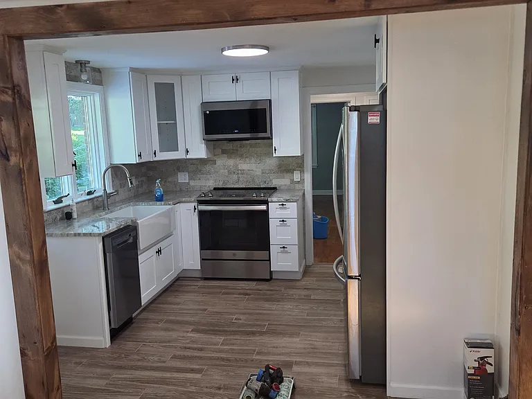 Open kitchen. View from dining room.