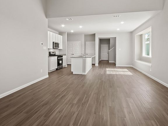 Family Room to Dining Area and Kitchen