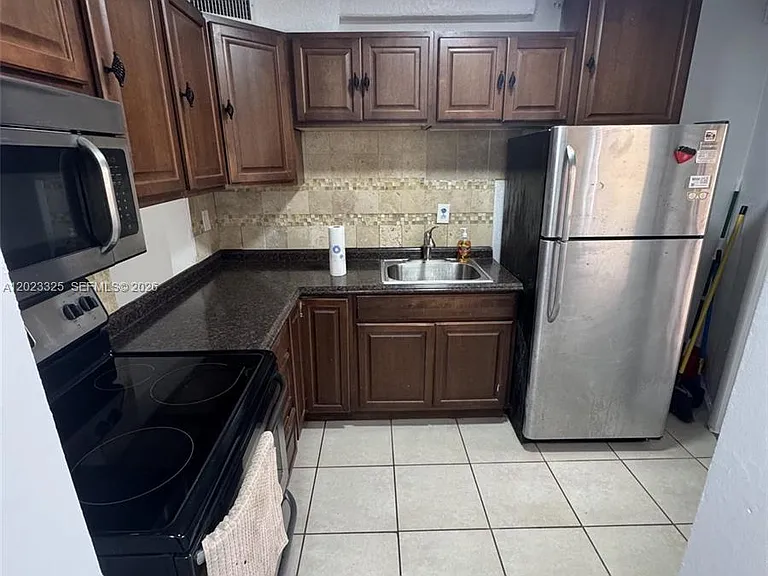 1643 NE Miami Gardens Dr #121 — Photo 9