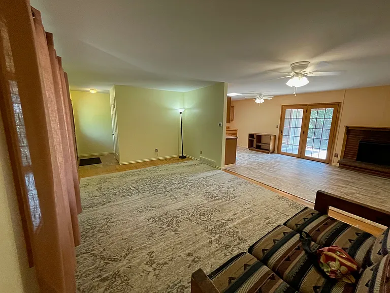 Living room view to dining/kitchen area.