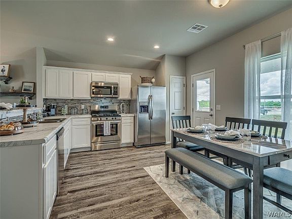 5th image of 14033 King Arthur Ct