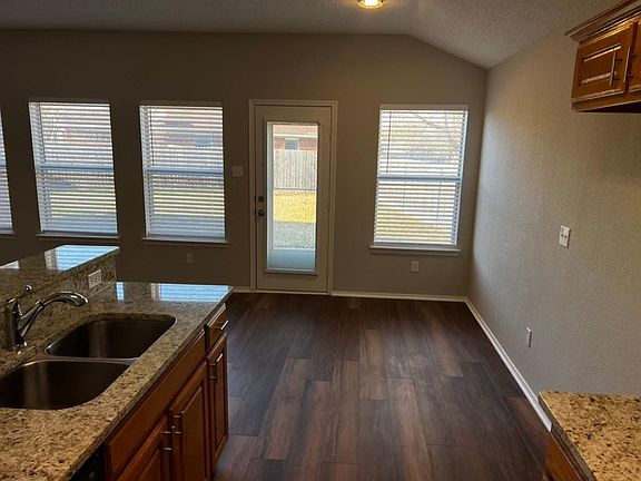 New counters, sink, and appliances.