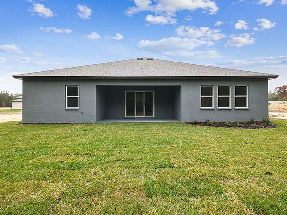 Sapphire new construction quick move-in home 1285 Kelsa Anne Dr. rear centered view at Whiting Estat