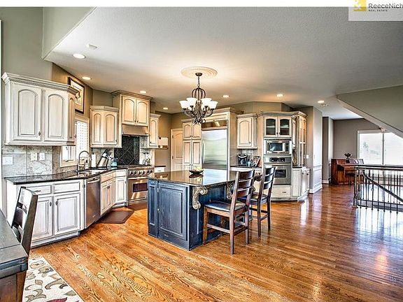 Breakfast room off of the kitchen area leads to over sized covered deck.