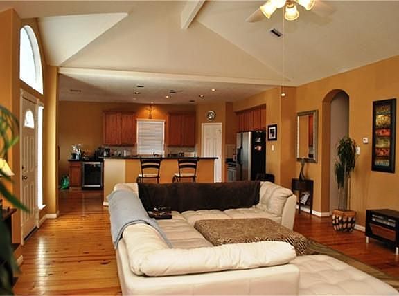  Open floor plan between kitchen and living room.