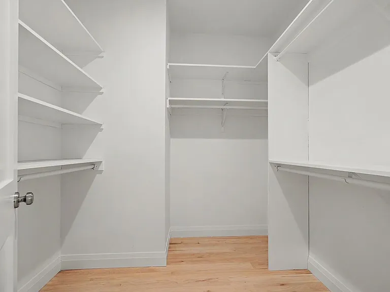 Primary bedroom w/custom closet