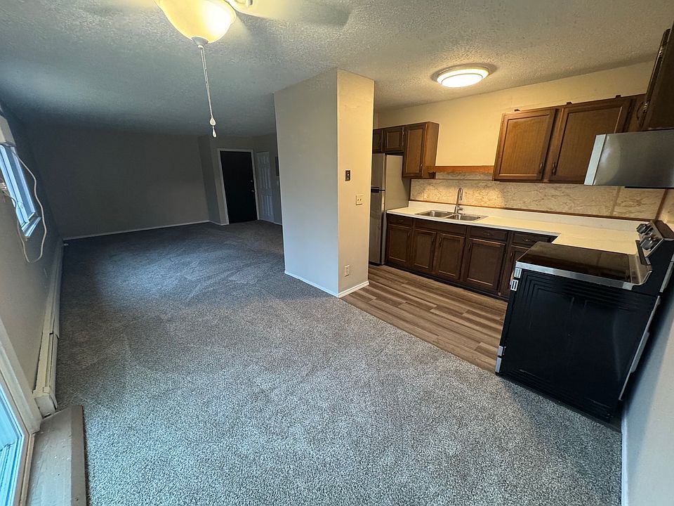 Living, dining, and kitchen.