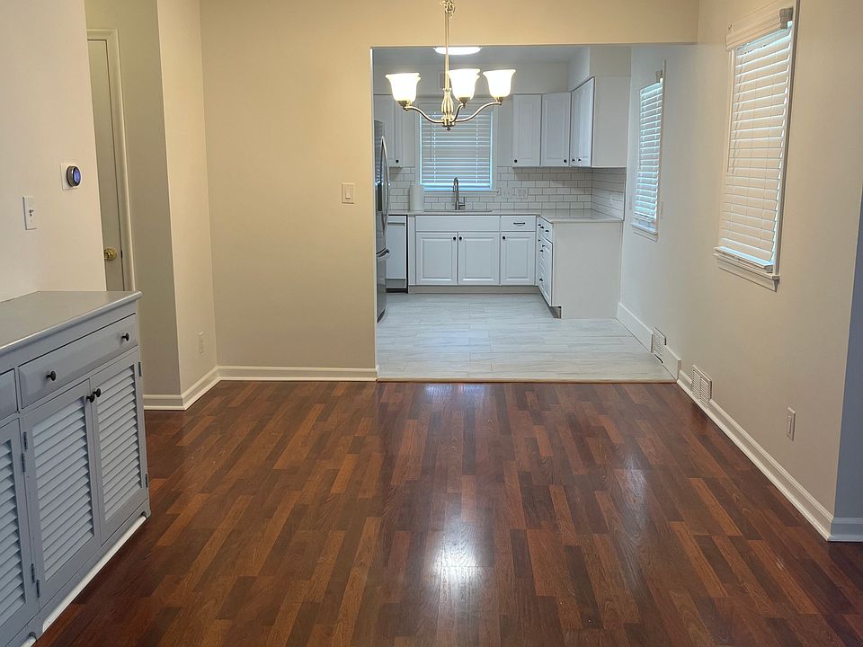 Living room, through dining area, to remodeled kitchen.