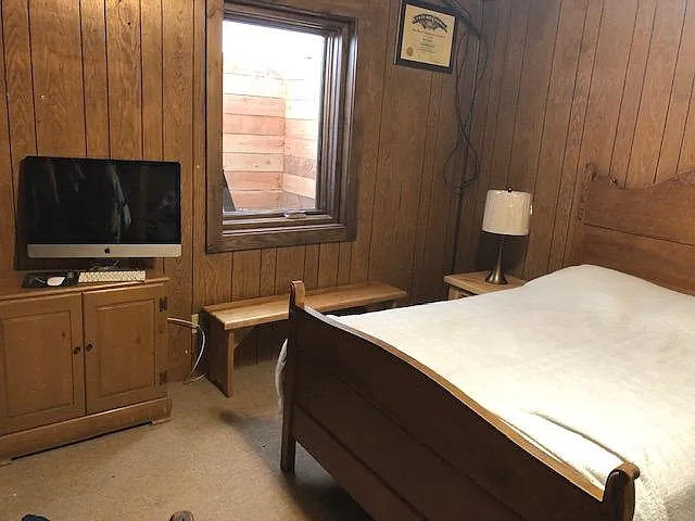 Extra bedroom downstairs with egress window. Double size mattress.