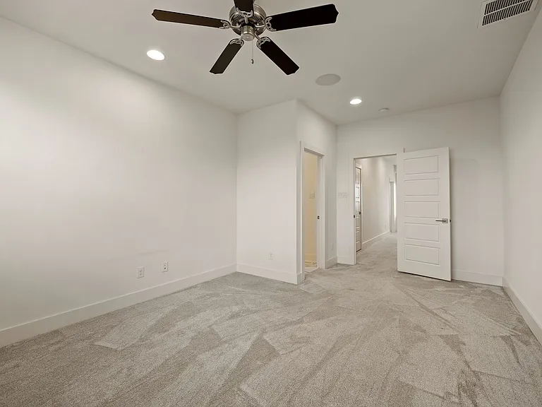 Master bedroom with en suite master full bathroom with walk in closet off master bathroom