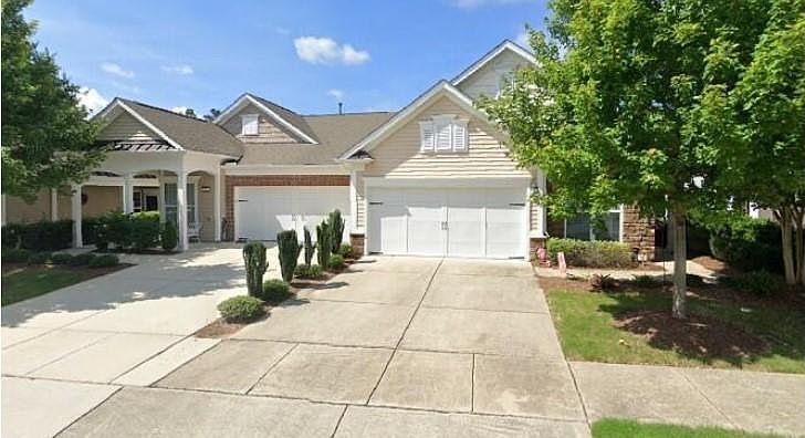 Ranch-style, Garden Home. 825 is the home on the right