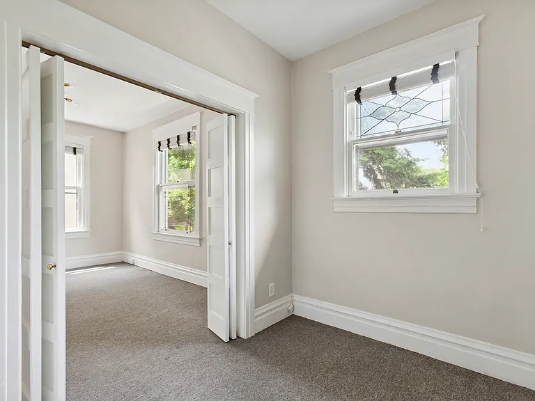Second bedroom or home office opens into spacious living area