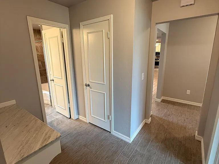 Hall looking towards the Entry and Hall Bathroom