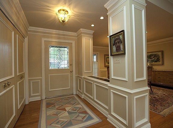 Elegant Entry with Lots of Crown Molding