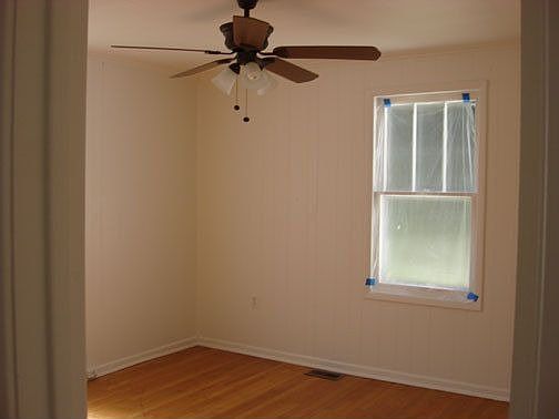 Bedroom 1- Hardwood Floors & New Ceiling Fan