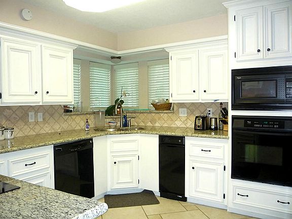 Updated Kitchen * Granite Countertops * Travertine Backsplash and Flooring