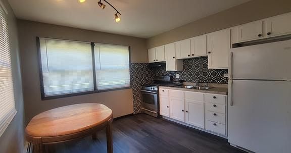 2nd image of 115 S Whispering Hills Dr #1