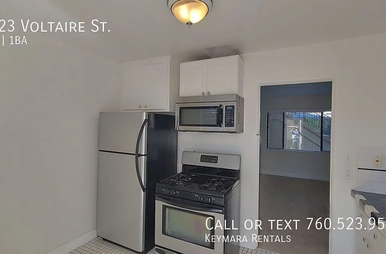 5123 Voltaire St — Photo 8