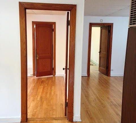 2nd bedroom and living room view from dining room