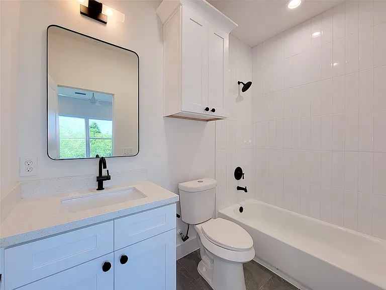 7705 Earl Rudder Way — Photo 11