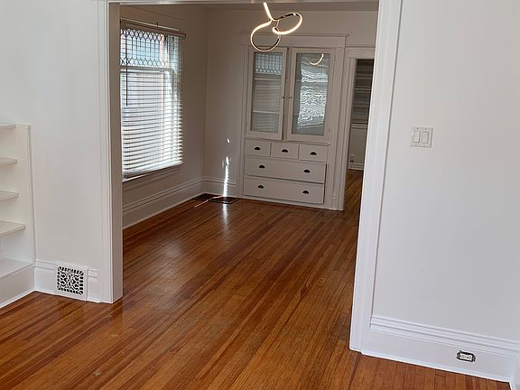 Interior view of dining area and china hutch.