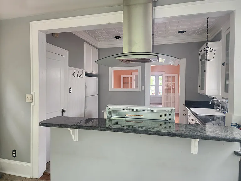Kitchen, dining and living room, looking from utility room