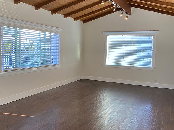 Open beam ceiling in living room adds character