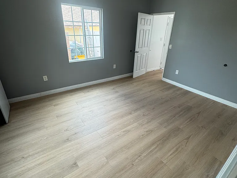 Another view from master bedroom near the bathroom. It has a door leading to kitchen or to the hallway