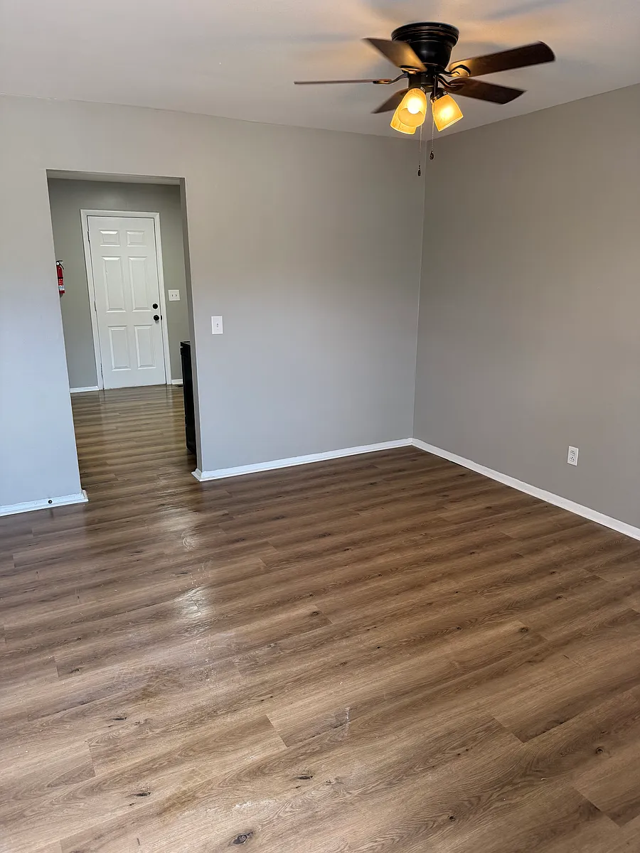 Living room leading into kitchen - 695 S Peterman Rd #695